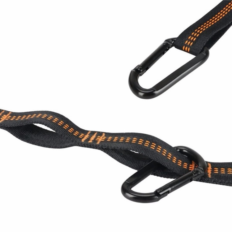 Black carabiner attached to an orange-stitched webbing strap