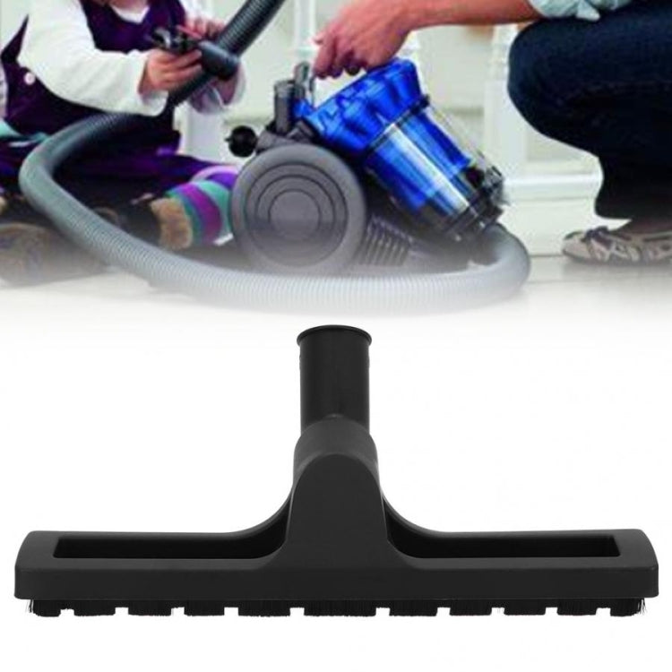 Black vacuum cleaner floor brush head attachment with bristle strip and wide nozzle