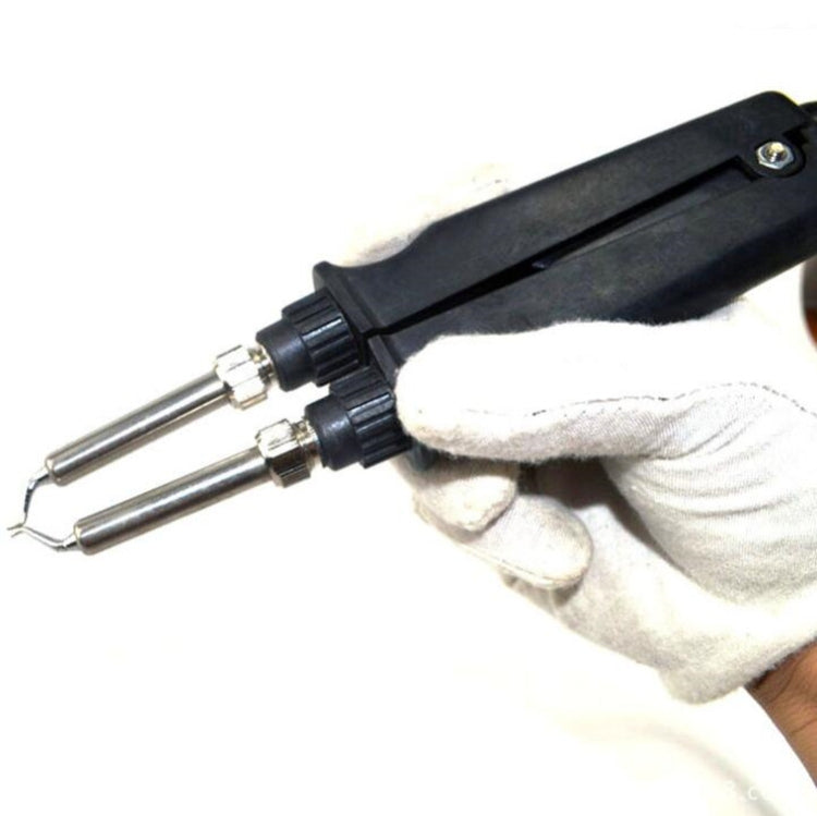 Handheld soldering iron tweezers clip with two metal tips and black mounting housing