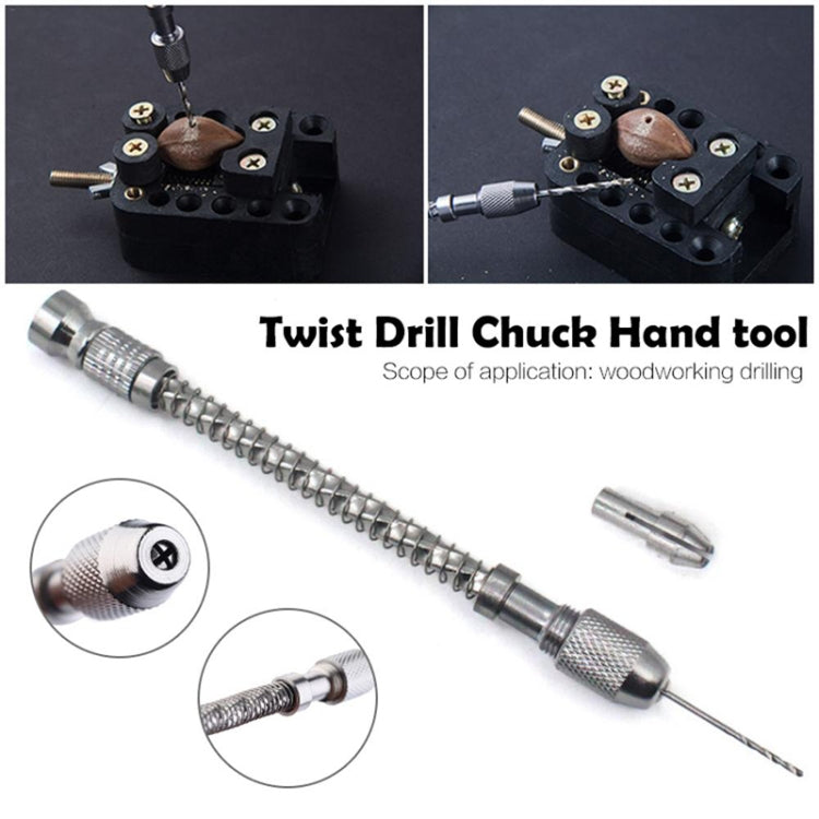 Twist drill chuck hand tool with black base drilling jig and mounted bit