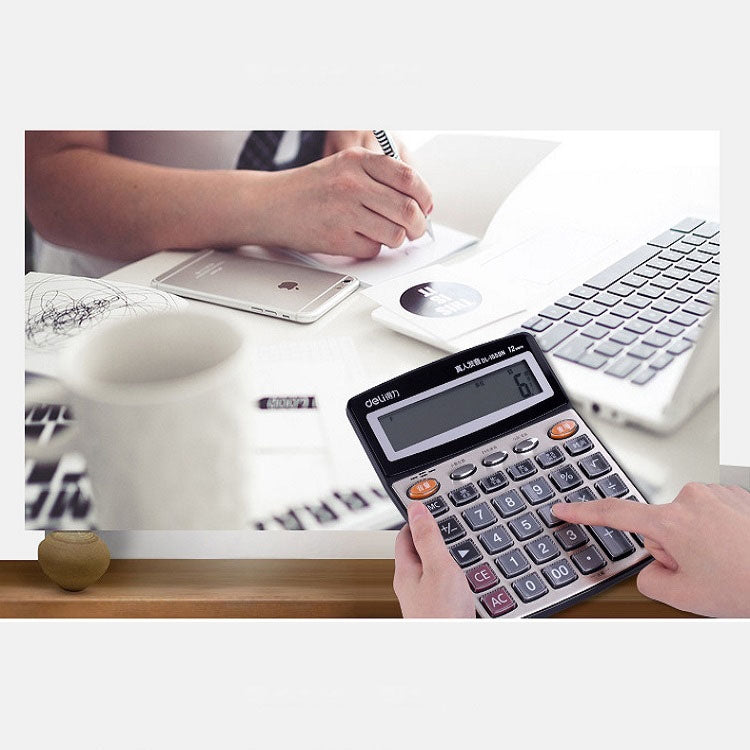 Deli calculator on desk next to a keyboard, 12-digit LCD display visible