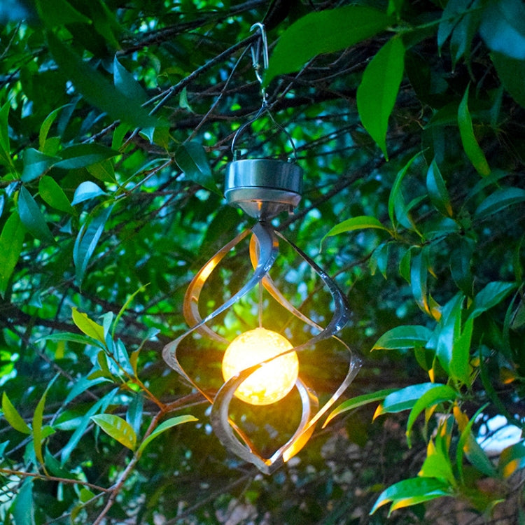 Hanging solar wind chime lamp with warm glowing frosted glass bulb