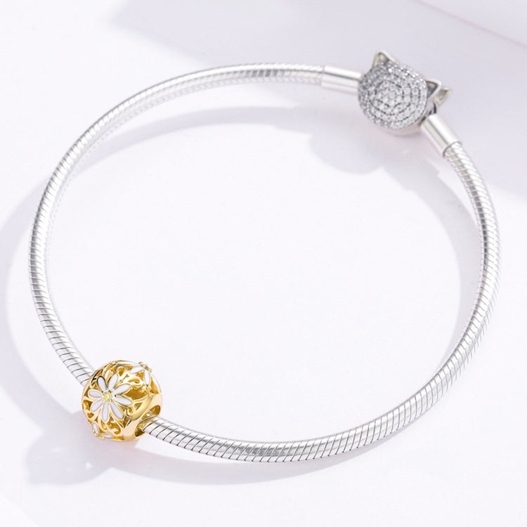 Silver snake bracelet with gold daisy charm bead and clasp