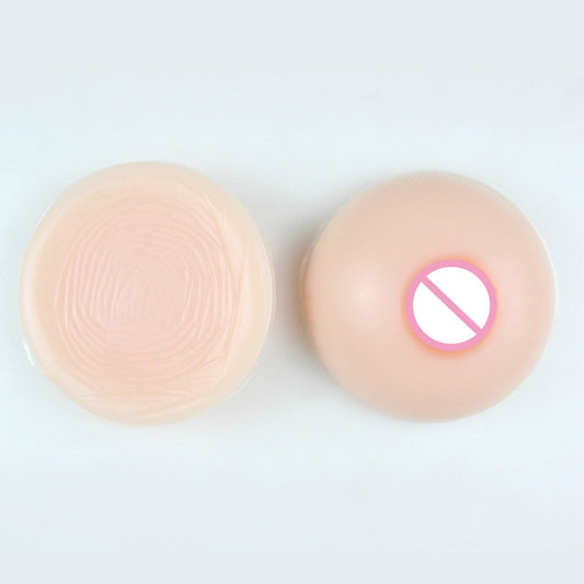 Round silicone breast inserts: textured face and areola nipple detail, 2-pack