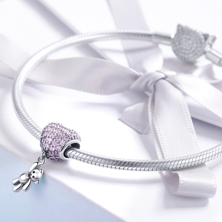 Sterling silver bead charm with pink zircon heart and small bear on chain
