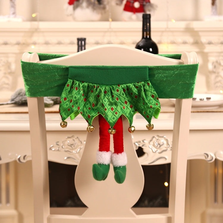 Green elf-style chair cover with patterned skirt and white-and-green hanging legs