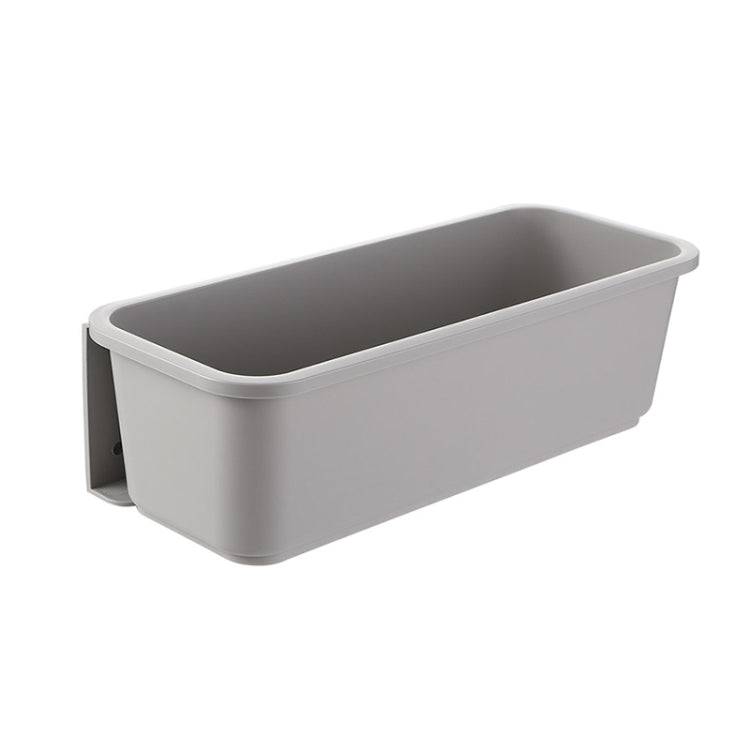 White wall-mounted kitchen drawer storage bin with side bracket and open interior