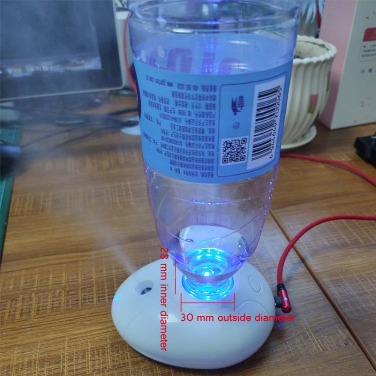 White ultrasonic humidifier base with bottle water container and blue-lit mist outlet