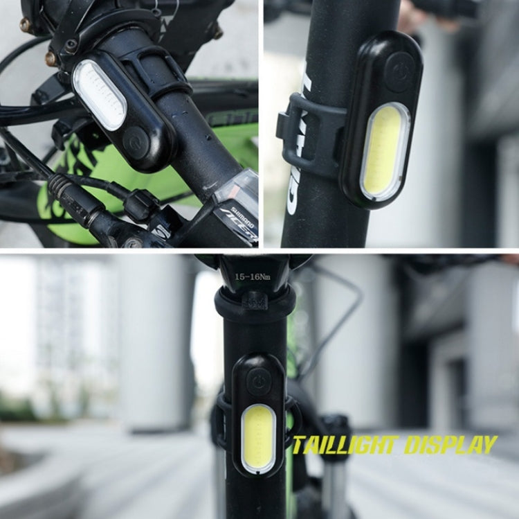 Bike tail light mounted on bike frame with oval LED lens and strap