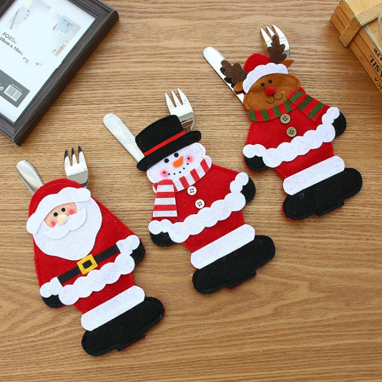 Assorted felt Christmas knife and fork covers: Santa, snowman, and elk with utensils