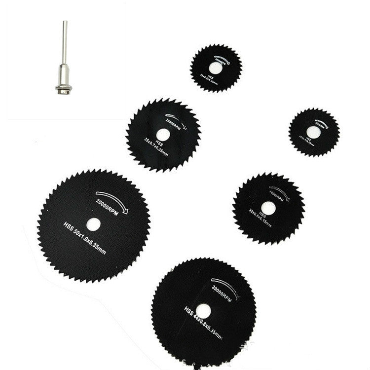 Assorted circular electric grinder saw blades with center holes, arranged on white background