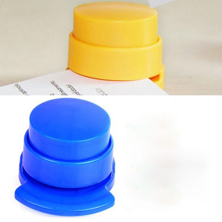 Needle-free paper stapler binder in yellow and blue