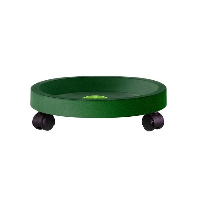 Green round wheeled plant pot tray with black caster wheels and recessed opening