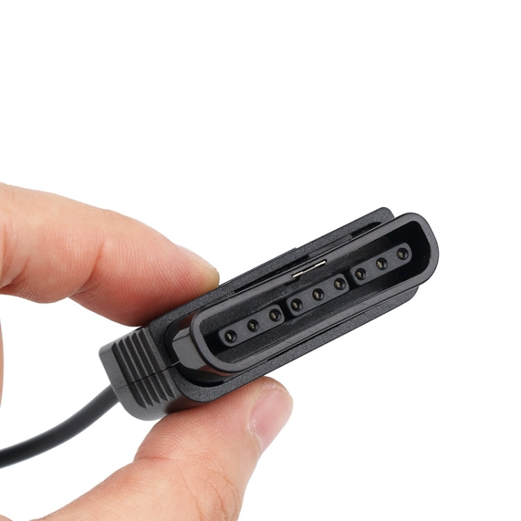 Game controller port adapter tip with 8-pin connector on black cable
