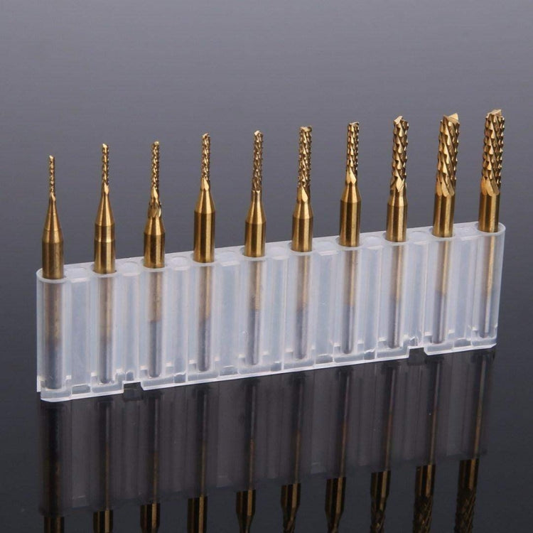 Ten gold-toned carbide end mill cutters in clear holder, fluted cutting edges