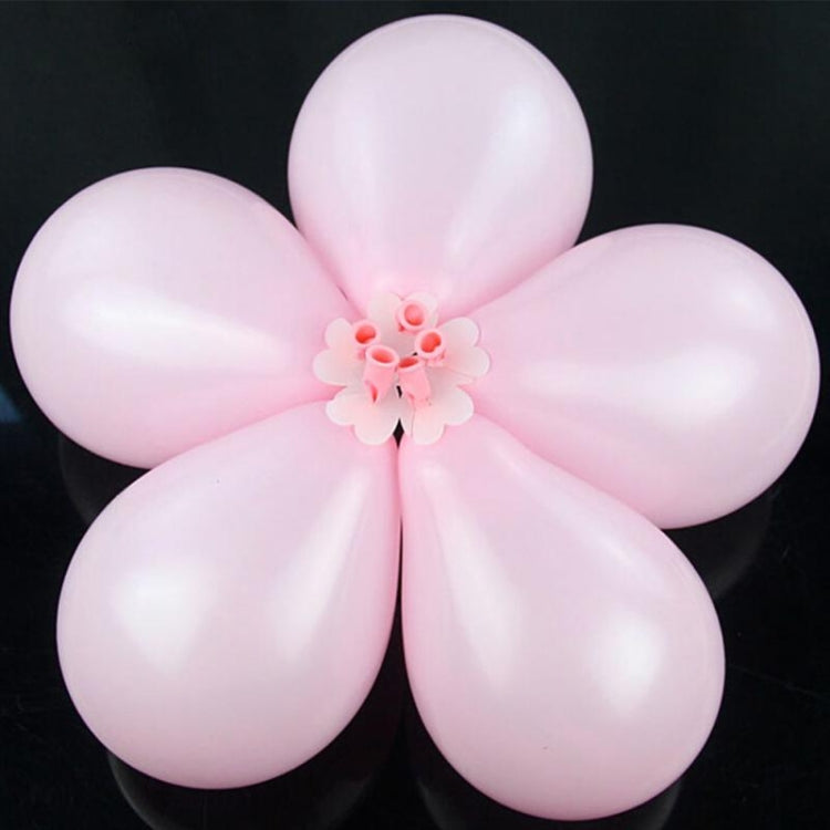 Pink five-petal balloon flower with small center flower detail