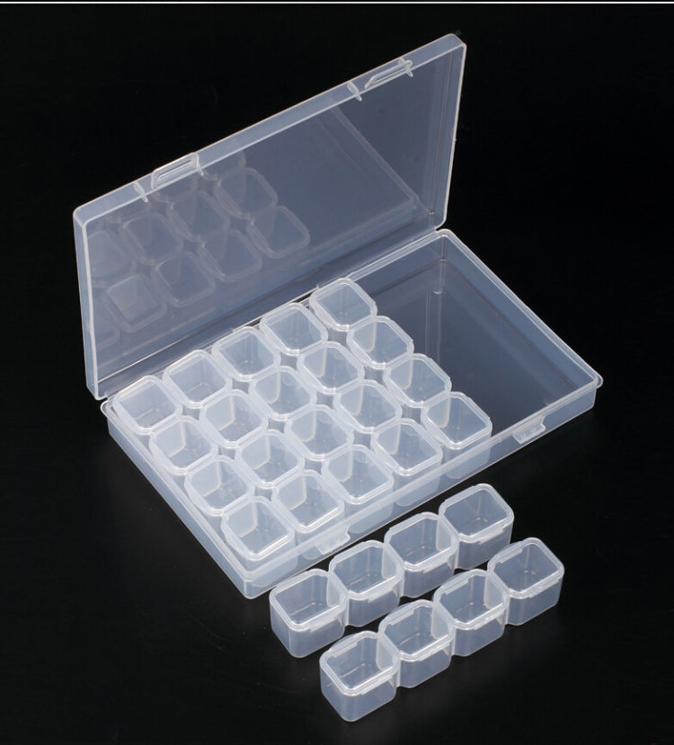 Transparent hinged storage case with 28 slots plus removable mini trays