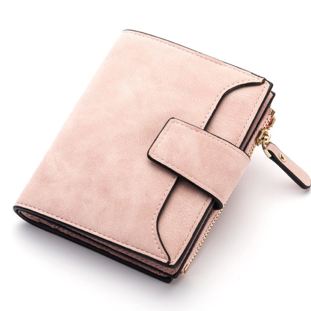 Pink slim leather coin pocket wallet with front magnetic hasp and wrist strap loop