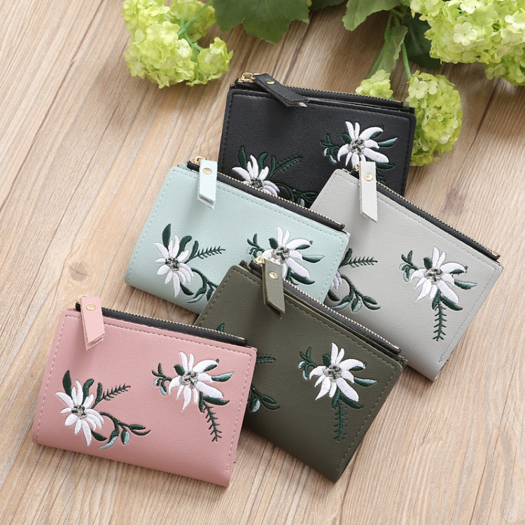 Set of floral embroidered short wallets with zipper closures in black, green, light blue, and pink