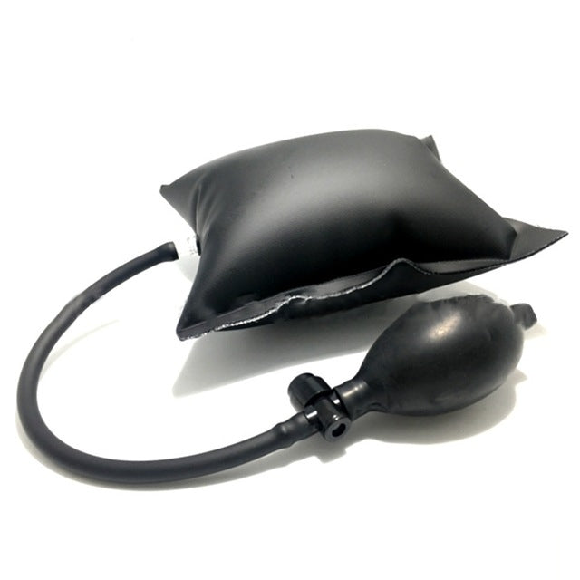 Black inflatable air wedge lockout tool with hand pump bulb and hose