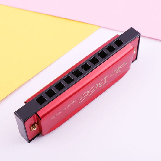 Red 10-hole C-tone harmonica with black mouthpiece bar and gold end screws