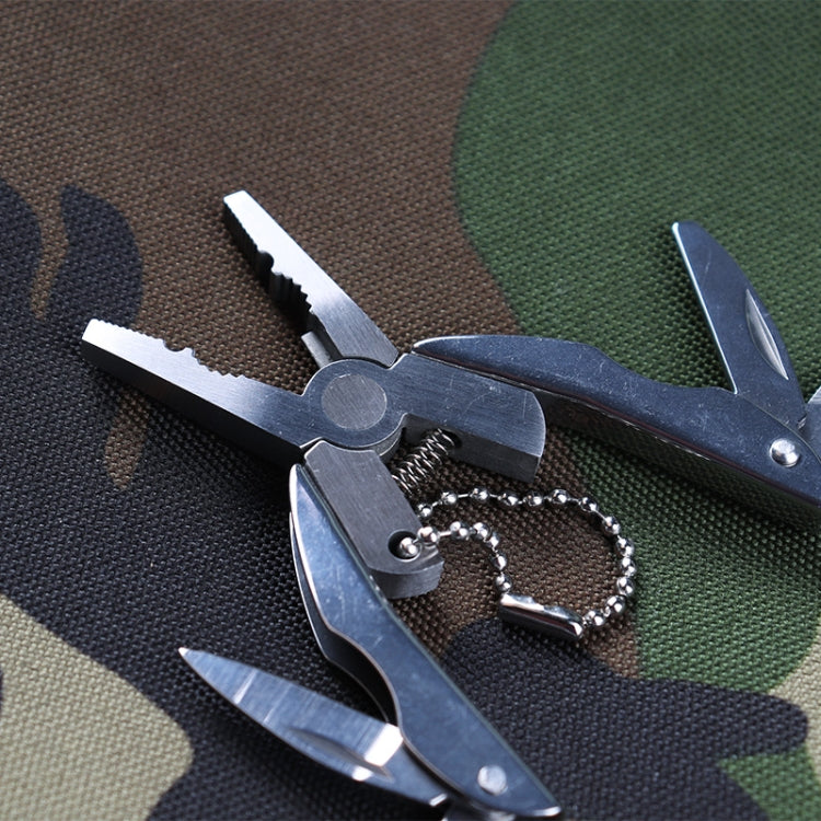 Stainless steel folding multi-tool with screwdriver bit and keychain chain on tool handles