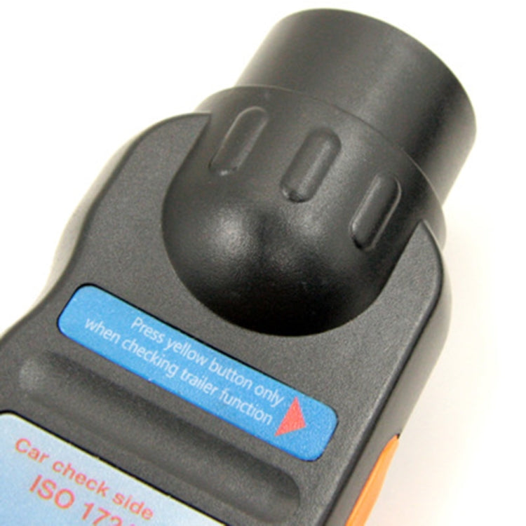 Button and indicator label on 7-pin trailer plug socket tester, black handle