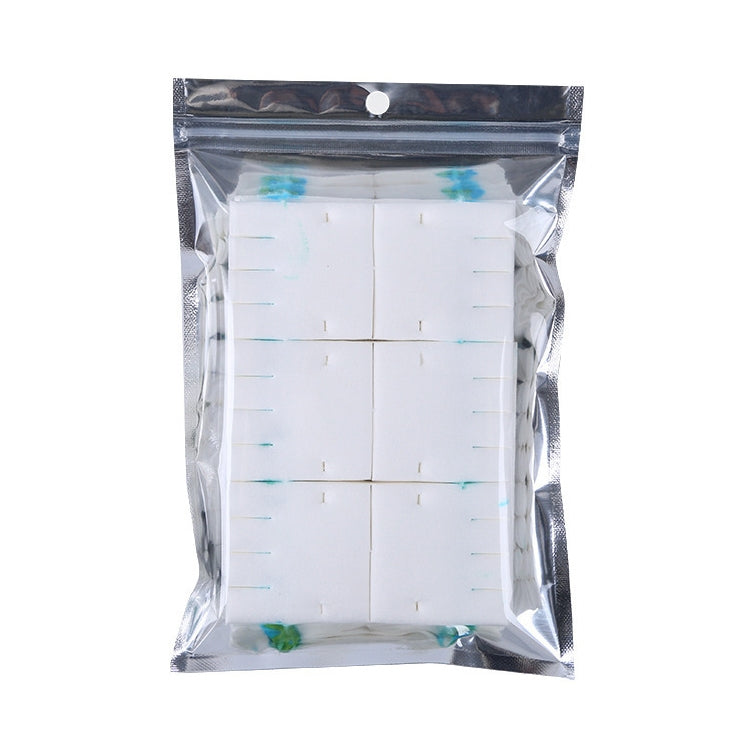 Packaged replacement toilet brush core pads, white with blue marks in clear plastic pouch