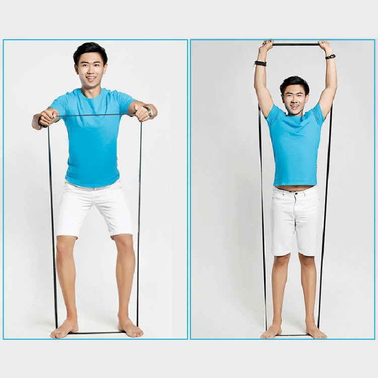 Latex resistance band for upper-body stretching, held overhead by arms