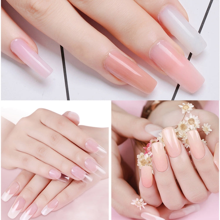 Hands with long pastel pink and clear poly gel nails