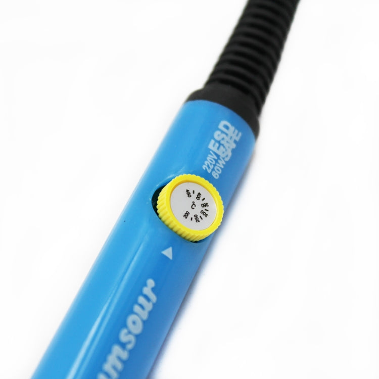 Blue soldering iron barrel with temperature control dial and printed settings