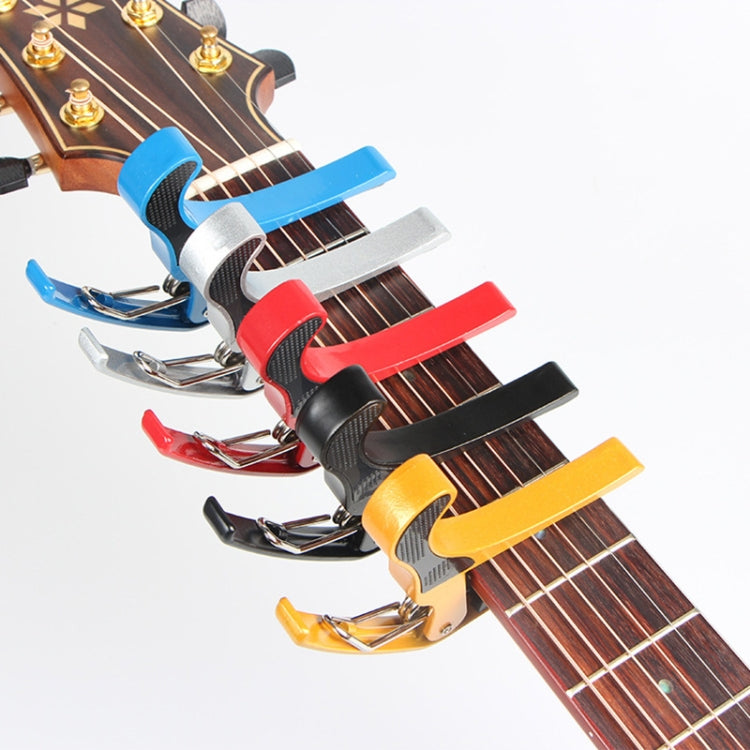 Colorful plastic 6-string guitar capo set with spring clamps: red, blue, yellow