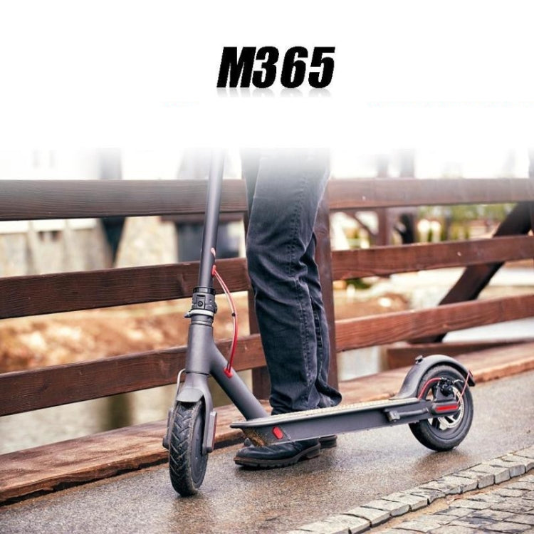 Rear disc brake cable installed on electric scooter, red cable line with metal ends