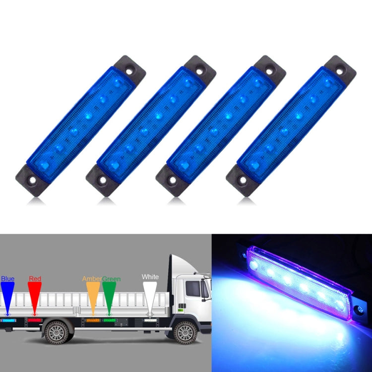 Set of four blue LED side marker lights glowing with rectangular clear lens