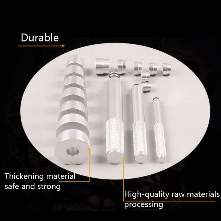 Close-up of silver metal bearing tool components: drivers and assorted sockets