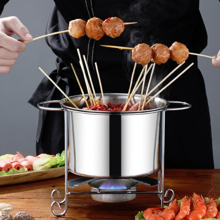 Stainless steel shabu-shabu pot on alcohol burner stand, with skewers and open top