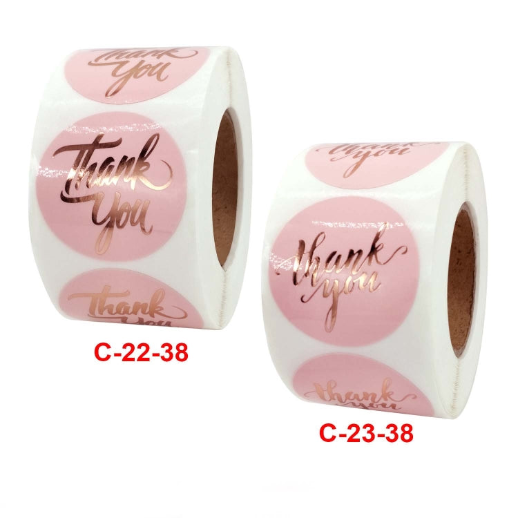 Two pink 'Thank You' sticker rolls with round labels, C-22-38 and C-23-38