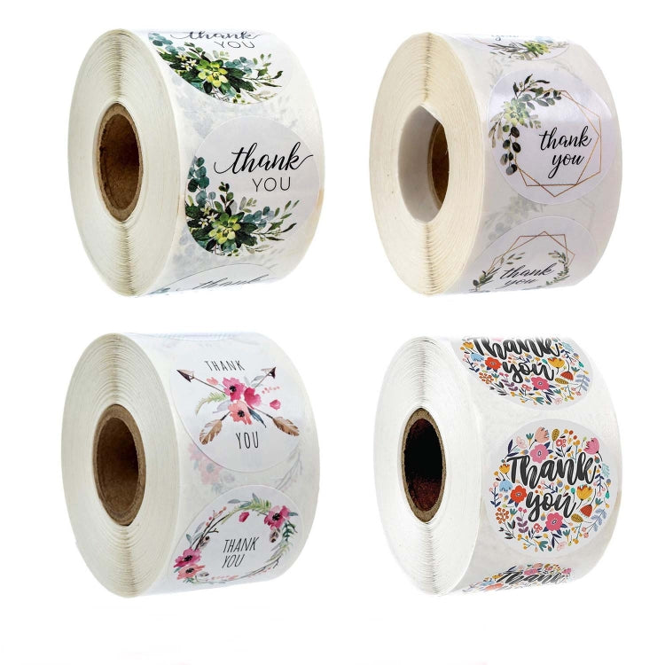 Set of rolls of white Thank You stickers with mixed floral designs, multiple rolls shown