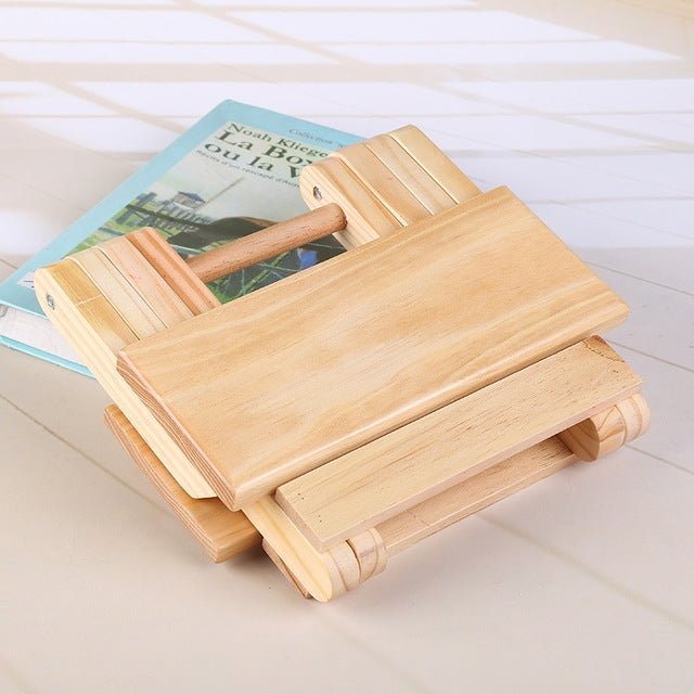 Pine wooden folding stool with two-panel slatted seat and folding legs, natural finish