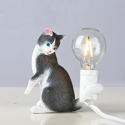 Cat mini night light: black-and-white cat figure holding a glowing light bulb