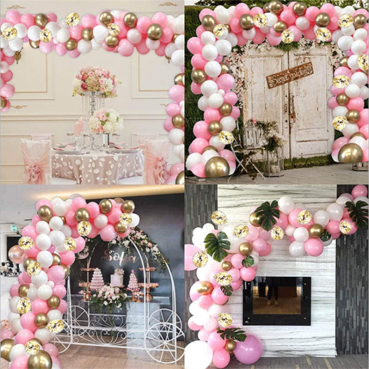Pink balloon decoration set with white and gold balloon arches for events