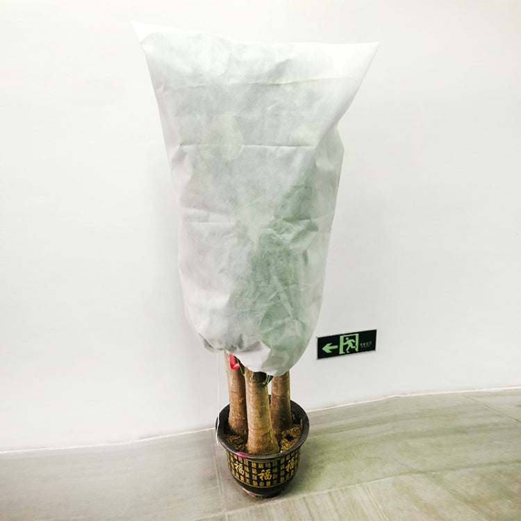 Non-woven plant freeze-protection cover bag, white, with green tag and gathered top