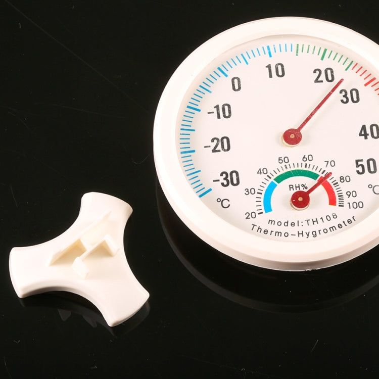 Clock-shaped hygrometer thermometer dial with temperature and RH scales, white case