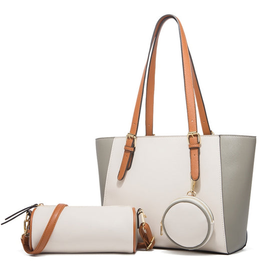3-in-1 women's tote handbag set in white with tan straps and matching wristlet pouch
