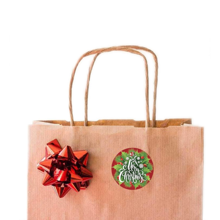Kraft paper gift bag with ribbon bow and round Christmas sticker label
