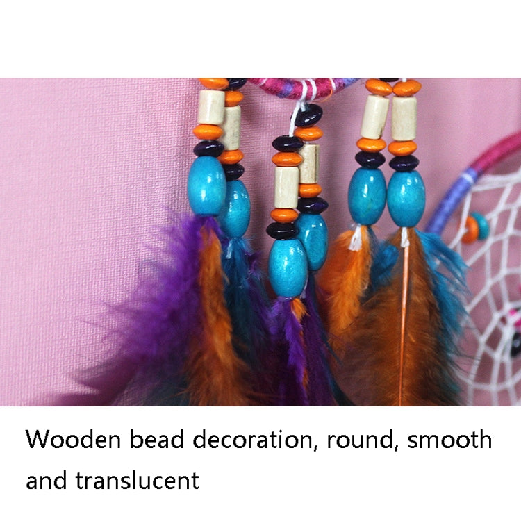 Dream catcher bead detail with smooth wooden beads and layered feather fringe