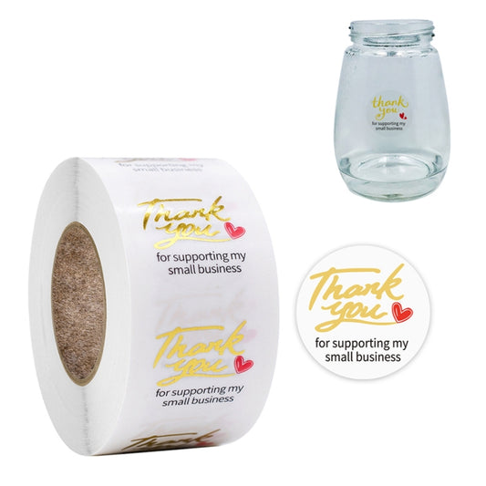 Transparent thank-you sealing stickers with gold script on roll and round labels