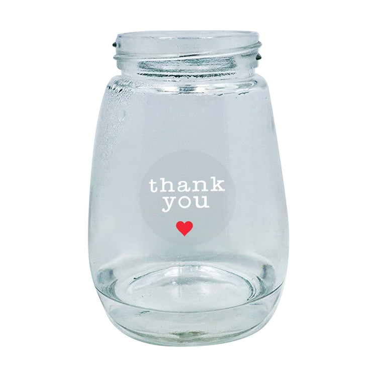 Thank you sticker on clear glass jar, white text and red heart icon
