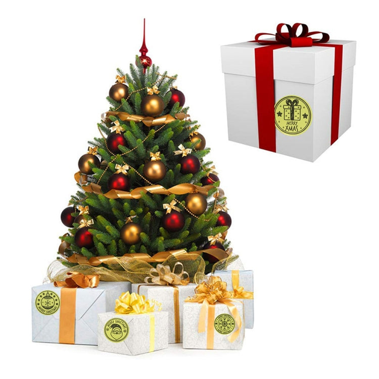 Christmas gift boxes with gold circular “Merry Christmas” sticker labels