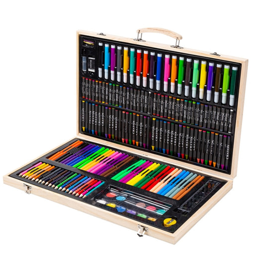 Open wooden art box with rows of colorful markers and crayons, plus accessory brush